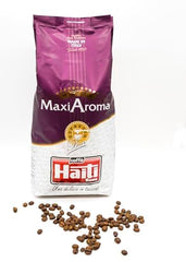 Café Caffè Haiti Roma Maxi Aroma en emballage de 1 kg. Mélange équilibré, torréfaction artisanale, fabriqué en Italie.