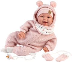 Llorens 1018480 Babypuppe Tala, aux yeux marron et au corps doux, Baby Puppe inkl. flauschigem rosa Tenue d'hiver, Schnuller, Schnullerkette, 44 cm