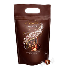 Boules de chocolat LINDOR aux noisettes, sac de 1 kg + fût Johnnie Walker Sherry 0,7 litre