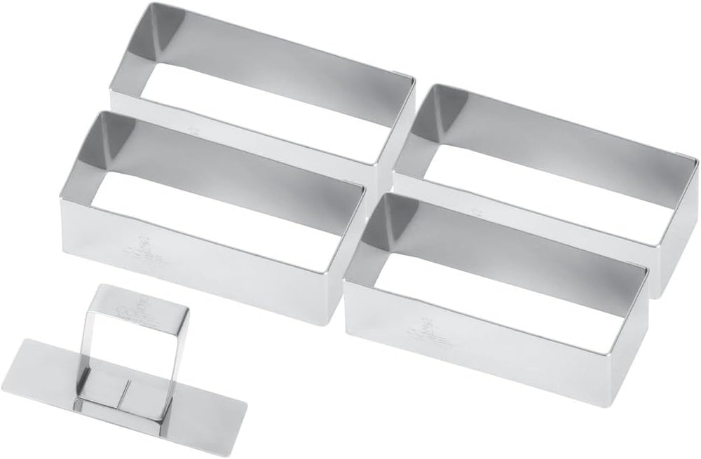 881780 La boîte contient 4 formes rectangulaires + un pilon en inox.