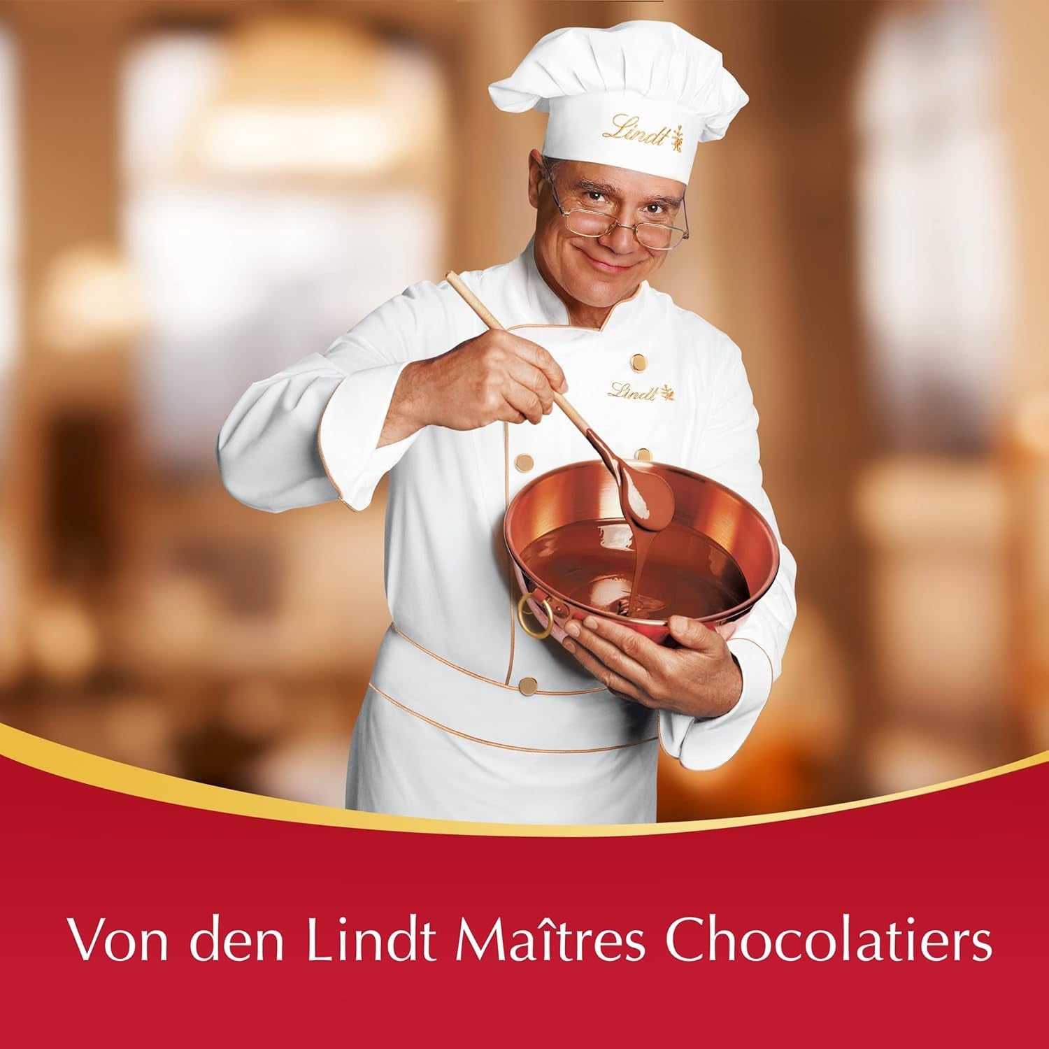 Prezentare de blat Lindor cu ciocolată | 1718 g și batoane de ciocolată cu marțipan | 25 batoane x 50 g într-un prezentare de blat | 1250 g | Marțipan pur acoperit cu ciocolată neagră | Batoane de ciocolată
