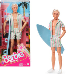 Barbie Movie Ken Barbie Doll en vêtements de plage rayés rose pastel et vert, planche de surf et baskets blanches, JBJ54