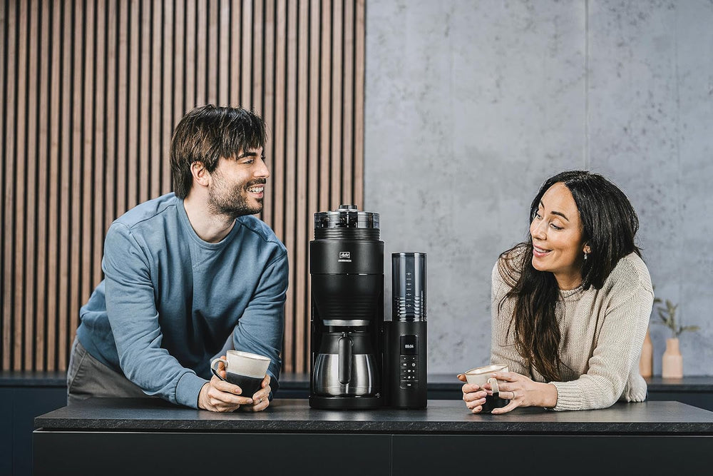 Melitta AromaFresh Therm Pro X - Machine à expresso avec filtre, moulin intégré, réservoir d'eau amovible, carafe thermique en acier inoxydable et fonction minuterie, pour jusqu'à 8 tasses de café, noir/argent