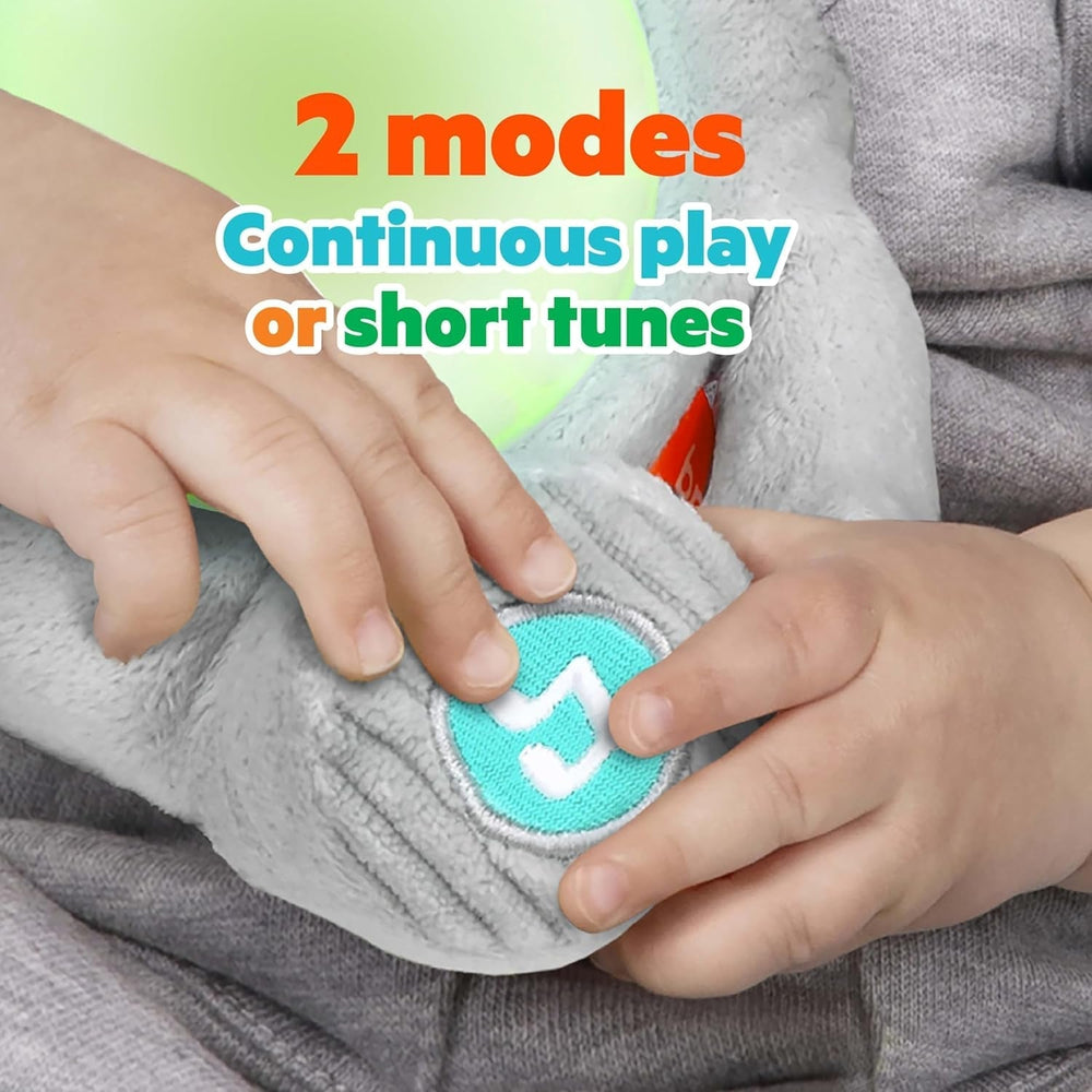 Bright Starts, jouet bébé éléphant Hug-a-bye avec lumières, chansons, différentes textures et plus encore, multicolore Jouets Bebe Naty Shop