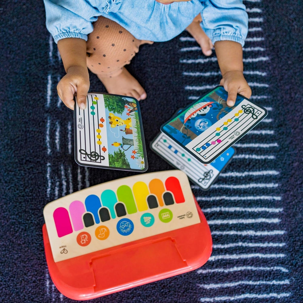 Baby Einstein 12577 Hape Cal's First Melodies Magic Touch Piano Pian muzical de jucărie din lemn cu 3 foi muzicale, 6 melodii, de la 6 luni, multicolor, 1 bucată (pachet de 1) Jucarii Bebe Naty Shop
