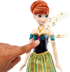 Mattel Disney Frozen Singing Anna Doll – Extrait de chanson de 30 secondes, tenue de château classique, jupe douce amovible, cheveux coiffables, pour enfants à partir de 3 ans, version allemande, HMG41