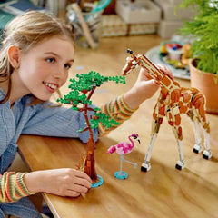 LEGO Creator 3In1 Animal Safari, set créatif avec figurines d'animaux, 3 options de construction : girafe, gazelle et lion jouets, animaux jouets pour filles et garçons, cadeau naturel pour les enfants à partir de 9 ans 31150 Jeux de construction Beuche den LEGO-Store