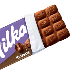 Milka Noisette – Chocolat au lait alpin fourré délicatement et crémeux aux noisettes – 25 x 90g