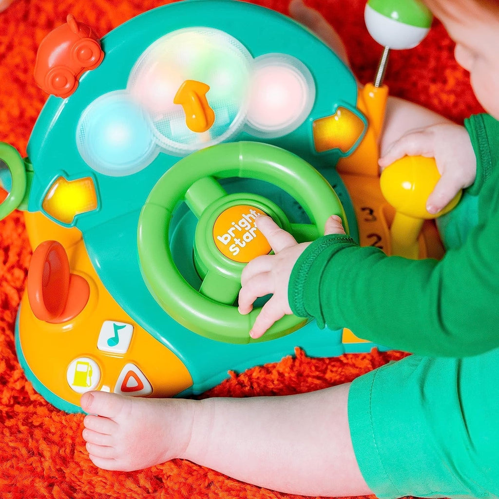 Bright Starts, volan de jucărie, Lights & Colours Driver, cu muzică, zgomote de mașină, indicatoare, levier de viteze și multe altele Jucarii Bebe Naty Shop