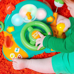 Bright Starts, volan de jucărie, Lights & Colours Driver, cu muzică, zgomote de mașină, indicatoare, levier de viteze și multe altele Jucarii Bebe Naty Shop