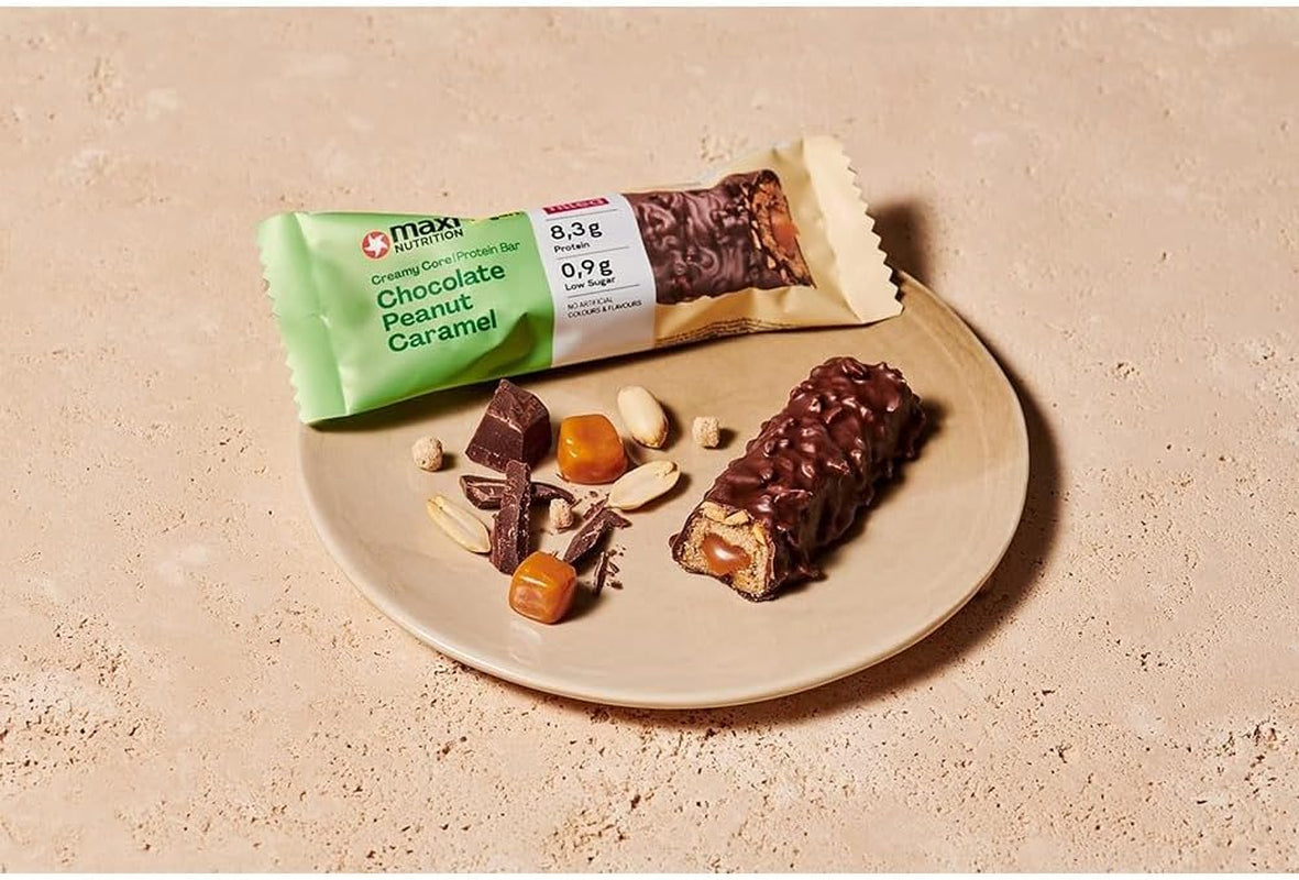 MaxiNutrition Barre protéinée végétalienne crémeuse au chocolat, cacahuètes et caramel 12x45g - barre protéinée végétalienne, 18% de protéines, 8,3 g par barre, faible teneur en sucre (0,9 g), sans sucre ajouté, sans arômes artificiels