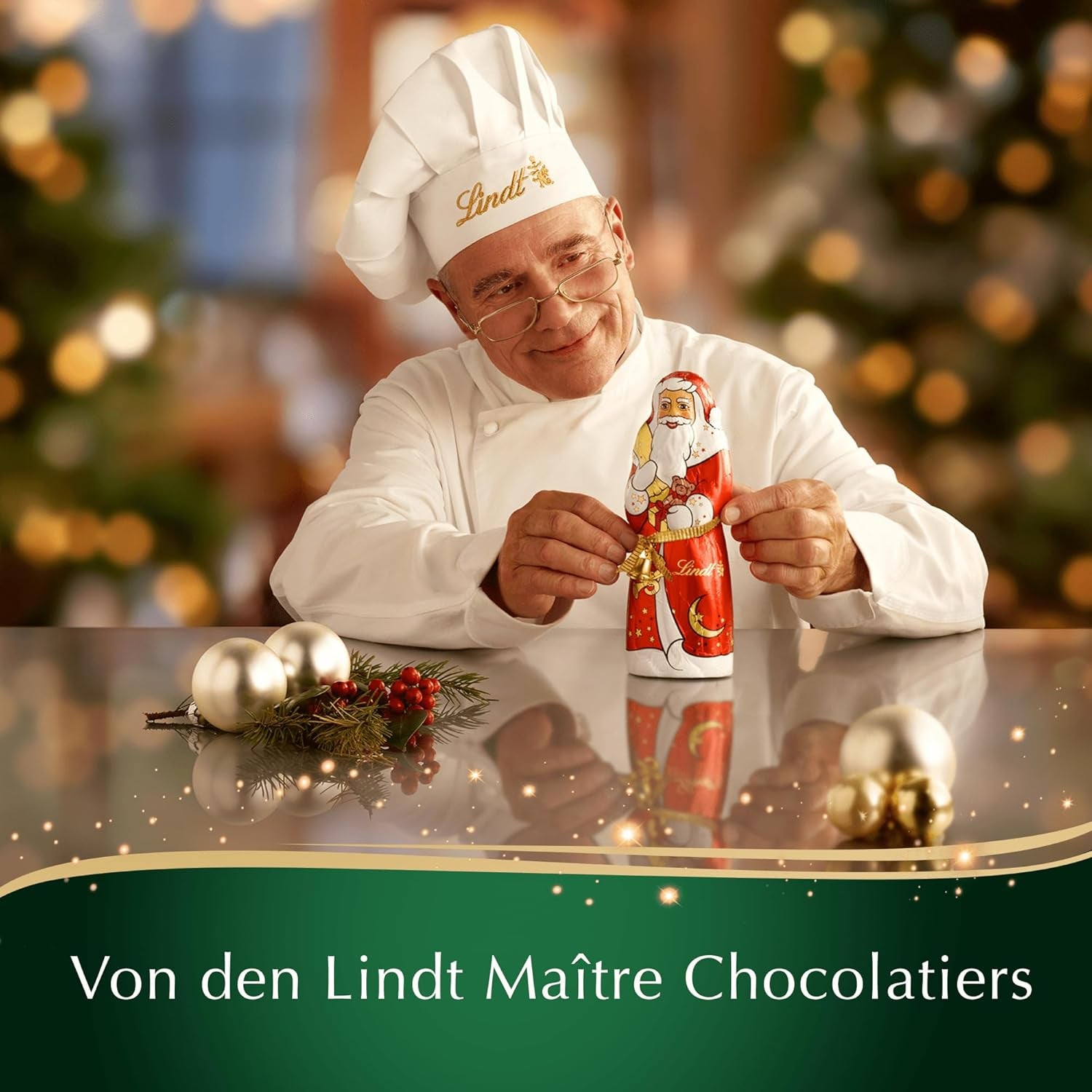 Barre de chocolat aux amandes de Noël Lindt | 100g | Amandes à la crème de noix recouvertes du meilleur chocolat au lait | Cadeau de Noël en chocolat