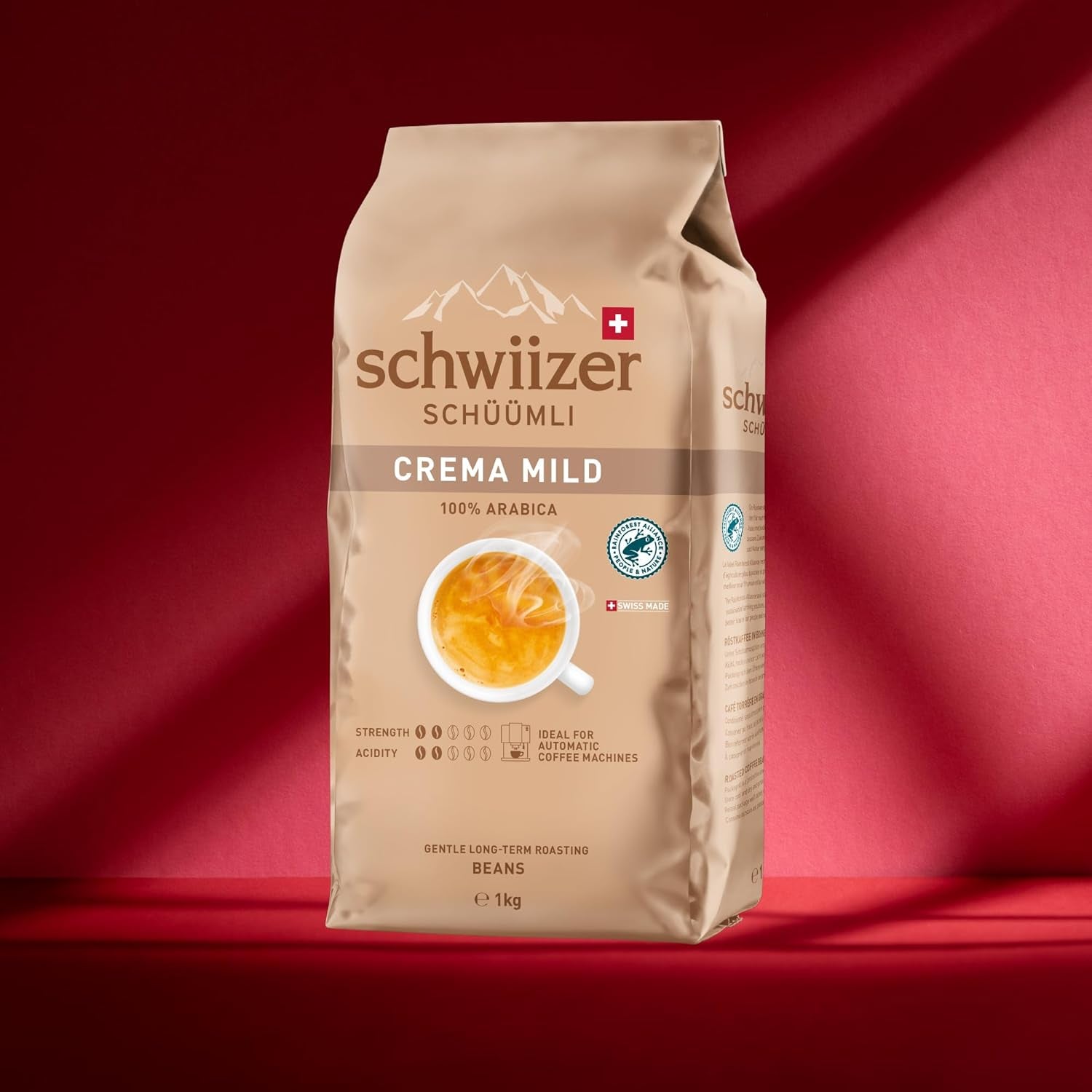 Schwiizer Schüümli Crema Mild, grains de café 100% Arabica fins, harmonieux et doux, idéal pour machines à expresso automatiques, force 2/5, torréfaction légère, Rainforest Alliance, 1kg