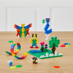 Plus-Plus 9607002 Geniales Konstruktionsspielzeug, Basic, Bausteine-Set dans une boîte métallique pratique avec Henkel, 600 pièces, cartonné