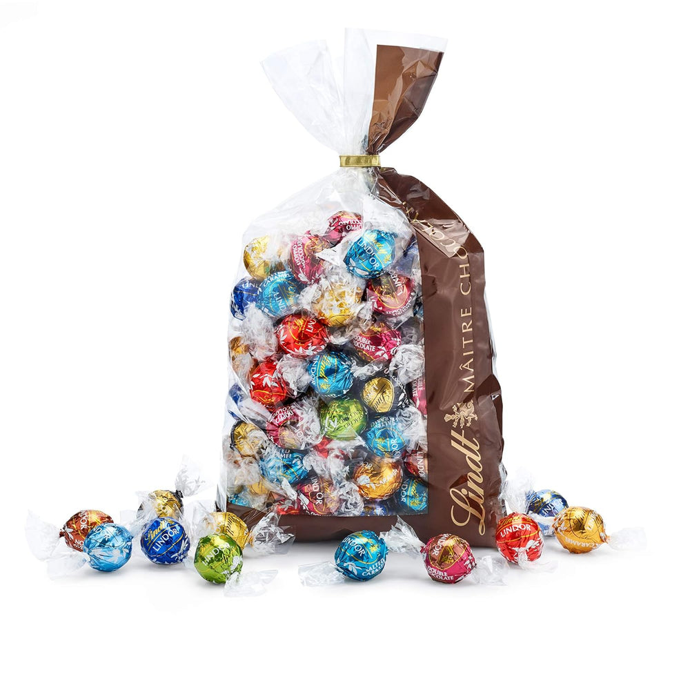 Mélange de chocolat LINDOR | 1371g | Env. 109 boules : Boules de chocolat au lait et LINDOR à la crème de fraise | Sac de 1 kg, env. 80 boules de chocolat chocolat blanc à la crème de fraise