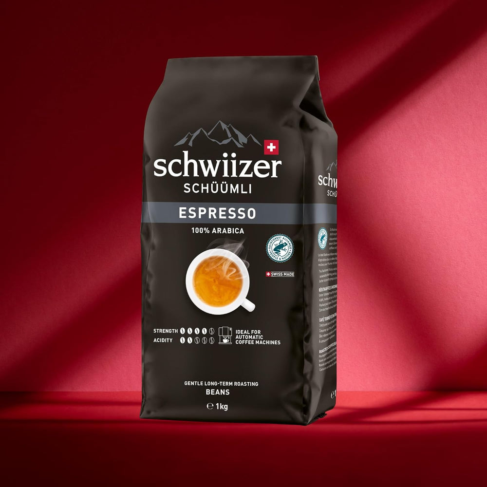 Schwiizer Schüümli Espresso, grains de café 100% Arabica, fort et intense, idéal pour machines à expresso automatiques, force 4/5, torréfaction moyenne, Rainforest Alliance, 1kg