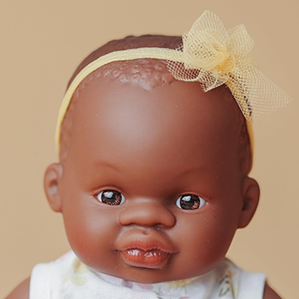 Chiot Miniland, 21 cm, fille africaine. Fabriqué en Espagne. Anatomiquement correct. Collection Mon ami et moi, fille africaine