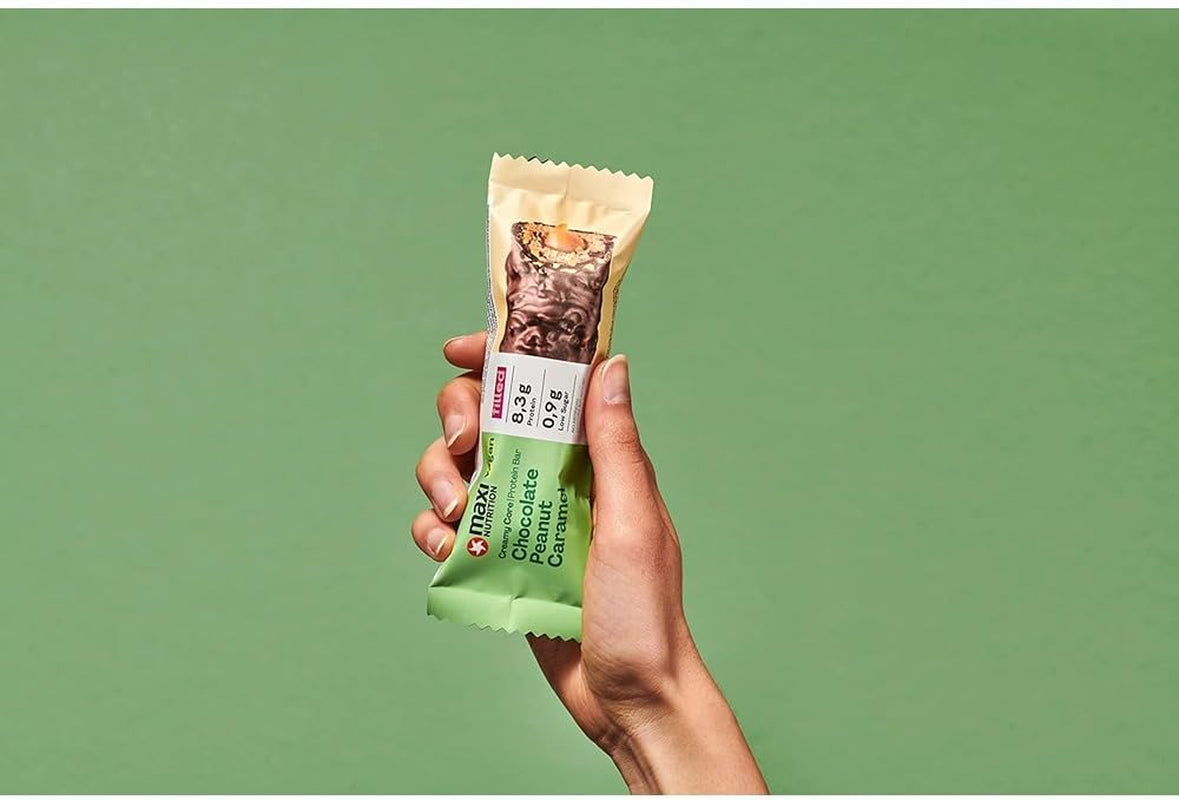 MaxiNutrition Barre protéinée végétalienne crémeuse au chocolat, cacahuètes et caramel 12x45g - barre protéinée végétalienne, 18% de protéines, 8,3 g par barre, faible teneur en sucre (0,9 g), sans sucre ajouté, sans arômes artificiels