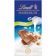 Chocolat Lindt | Barre de chocolat au lait et aux noisettes | 100g | Chocolat au lait onctueux et fondu avec des morceaux de noisettes croquants | Barre de chocolat
