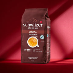 Schwiizer Schüümli Crema, café en grains 100% Arabica, aromatique et corsé, idéal pour machines à expresso automatiques, force 3/5, torréfaction moyenne, Rainforest Alliance, 1kg