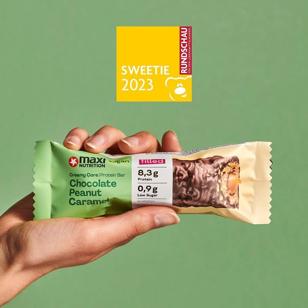 MaxiNutrition Barre protéinée végétalienne crémeuse au chocolat, cacahuètes et caramel 12x45g - barre protéinée végétalienne, 18% de protéines, 8,3 g par barre, faible teneur en sucre (0,9 g), sans sucre ajouté, sans arômes artificiels